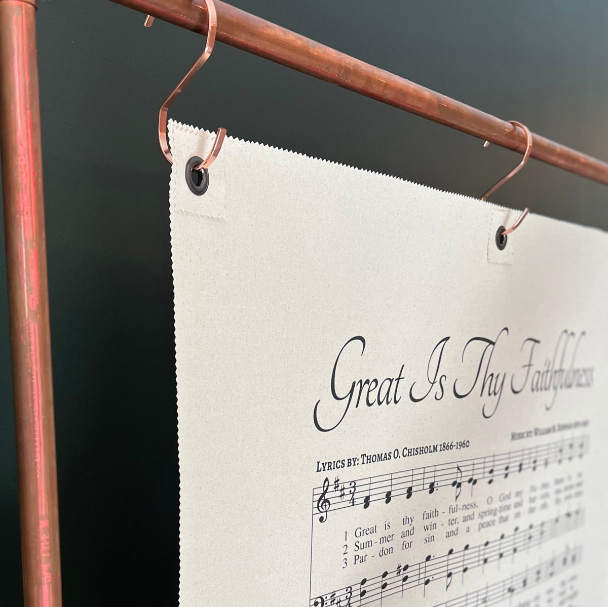 Close-up of Great Is Thy Faithfulness canvas wall hanging with reinforced hanging eyelet