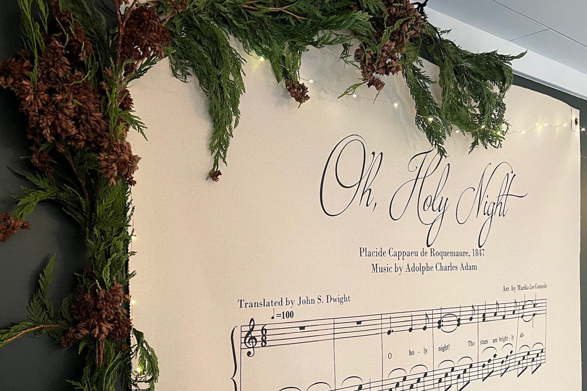 Oh Holy Night canvas banner with green garland.