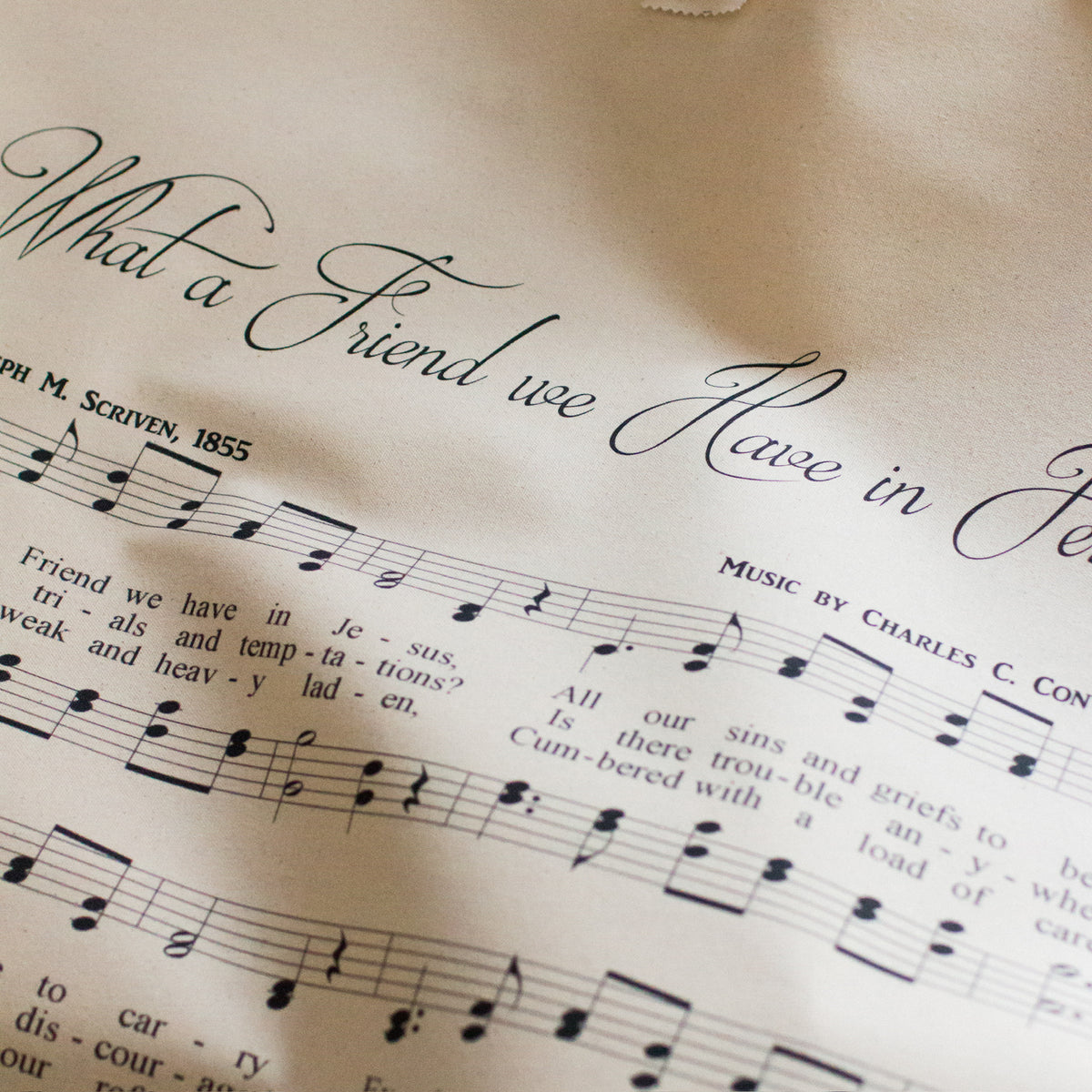 Close up of What a Friend We Have in Jesus hymn wall hanging
